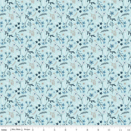 Image of the Winter Magic Floral Aqua quilting cotton fabric by Riley Blake Designs. Features flowers on a blue background. Cute Little Fabric Shop