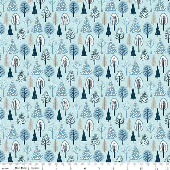 Image of the Winter Magic Trees Aqua quilting cotton fabric by Riley Blake Designs. Features trees on a blue background. Cute Little Fabric Shop
