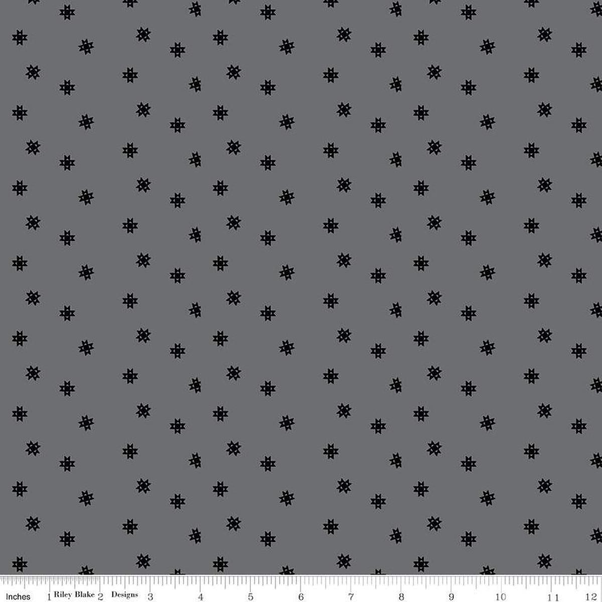 Image of Blackout Ohio Star Gray by The RBD Designers for Riley Blake Designs. Features stars on a gray background. Cute Little Fabric Shop