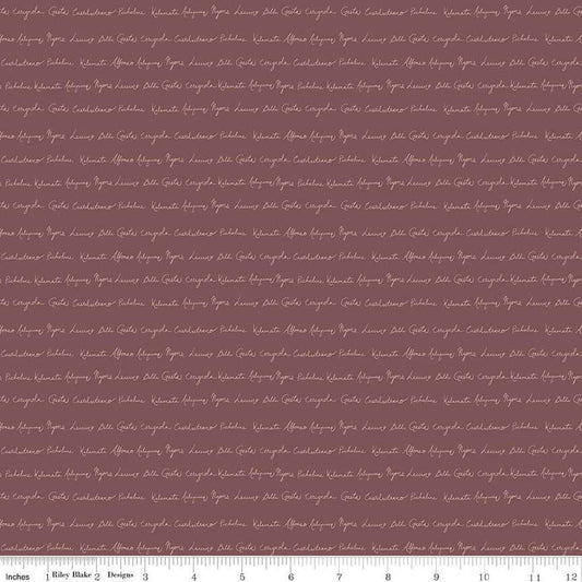 Image of Olive Grove Script Plum quilting cotton fabric by Amber Elliot for Riley Blake Designs. Features handwriting on a brown background. Cute Little Fabric Shop