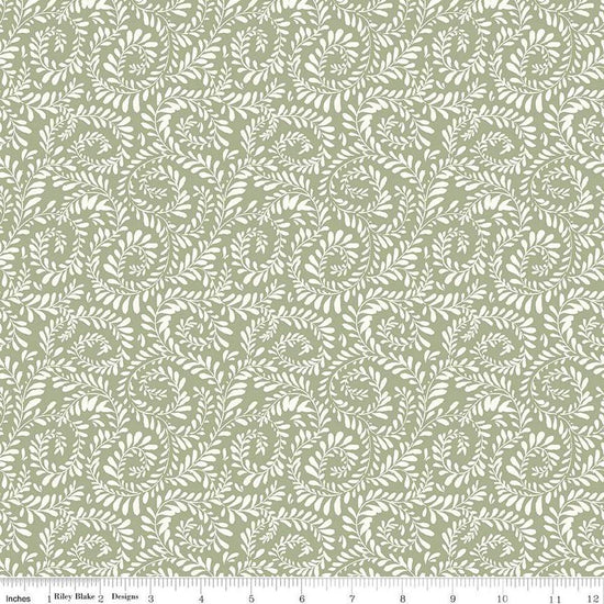 Image of Sunflower Whispers Ferns Green quilting cotton fabric by Lisa Audit for Riley Blake Designs. Features leaves on a green background. Cute Little Fabric Shop