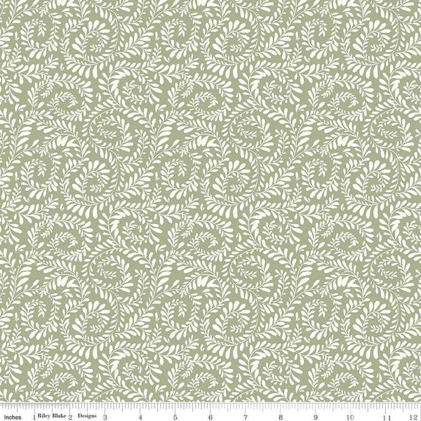 Image of Sunflower Whispers Ferns Green quilting cotton fabric by Lisa Audit for Riley Blake Designs. Features leaves on a green background. Cute Little Fabric Shop