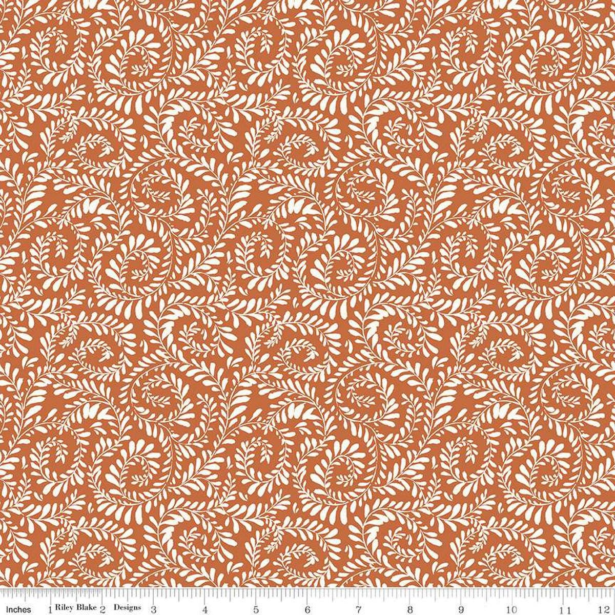 Image of Sunflower Whispers Ferns Pumpkin quilting cotton fabric by Lisa Audit for Riley Blake Designs. Features leaves on an orange background. Cute Little Fabric Shop