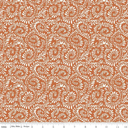 Image of Sunflower Whispers Ferns Pumpkin quilting cotton fabric by Lisa Audit for Riley Blake Designs. Features leaves on an orange background. Cute Little Fabric Shop