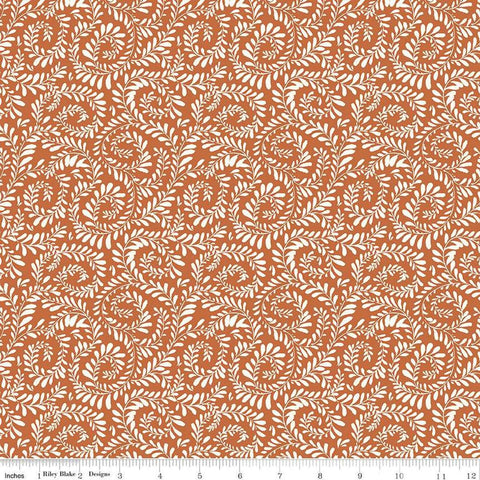 Image of Sunflower Whispers Ferns Pumpkin quilting cotton fabric by Lisa Audit for Riley Blake Designs. Features leaves on an orange background. Cute Little Fabric Shop