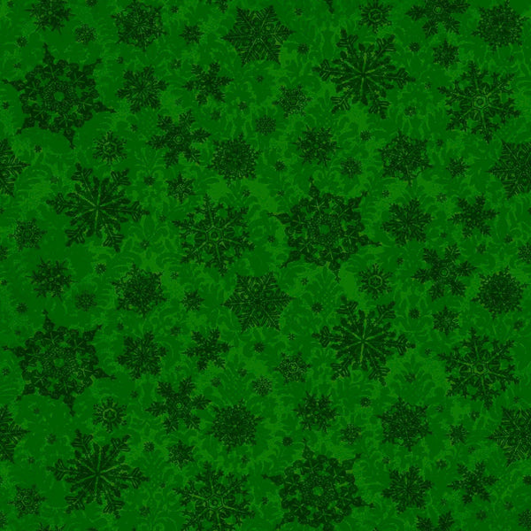 Image of the Poinsettia Greetings Poinsettia Tonal forest quilting cotton fabric by QT Fabrics. Features snowflakes on a green background. Cute Little Fabric Shop
