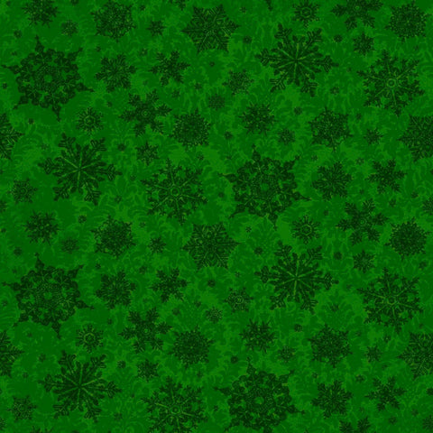 Image of the Poinsettia Greetings Poinsettia Tonal forest quilting cotton fabric by QT Fabrics. Features snowflakes on a green background. Cute Little Fabric Shop