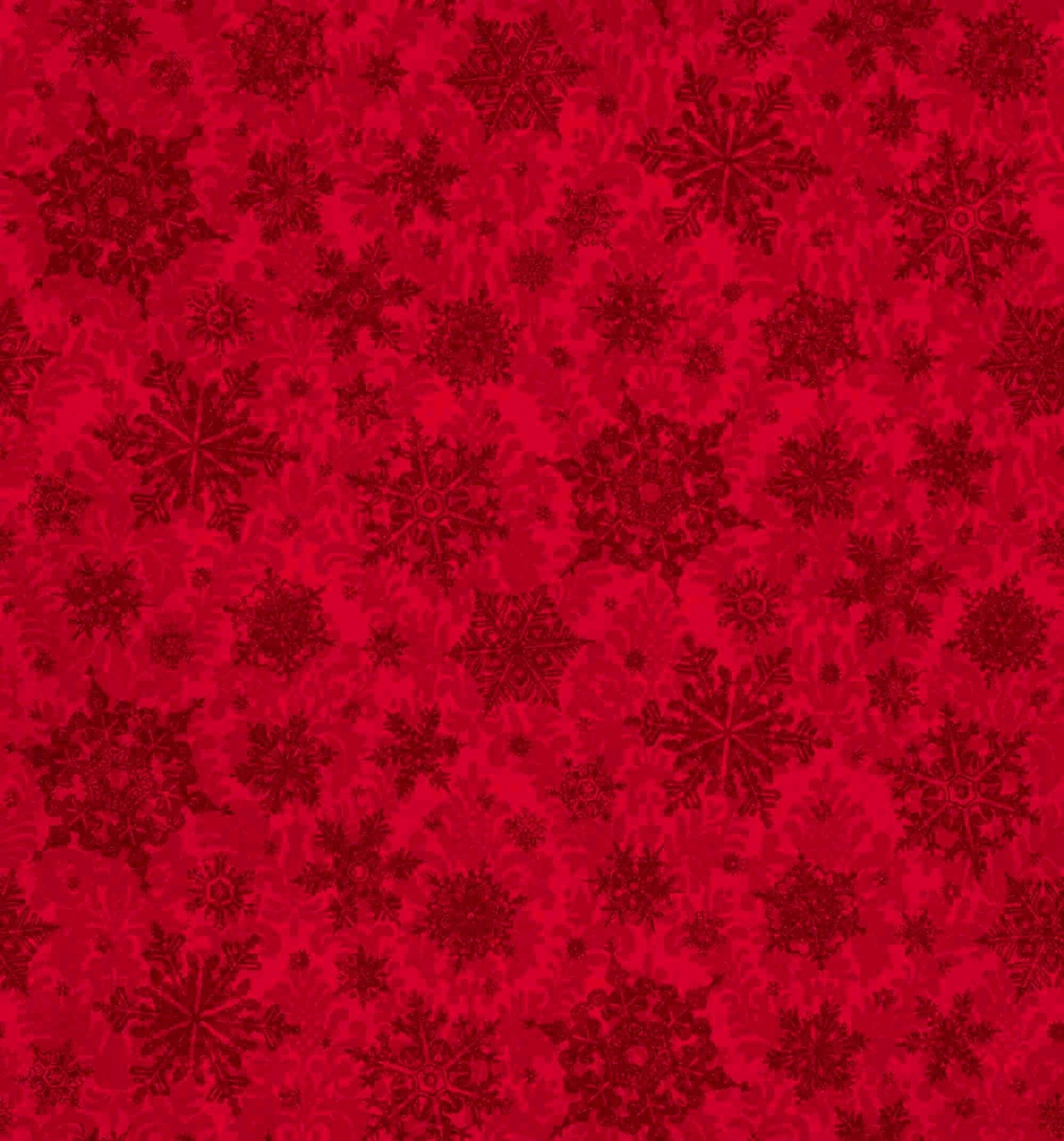 Image of the Poinsettia Greetings Poinsettia Tonal Red quilting cotton fabric by QT Fabrics. Features snowflakes on a red background. Cute Little Fabric Shop