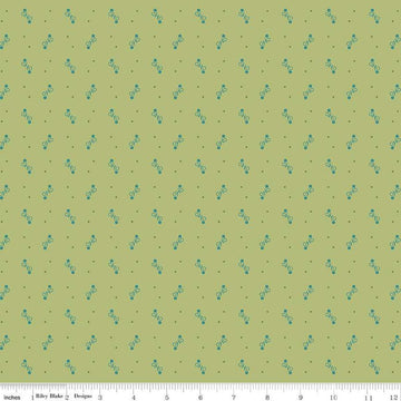 Image of the Gentler Times Ditty Lettuce quilting cotton fabric by Riley Blake Designs. Features dots on a green background. Cute Little Fabric Shop