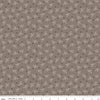 Image of the Gentler Times Pleasant Pebble quilting cotton fabric by Riley Blake Designs. Features dots on a gray background. Cute Little Fabric Shop