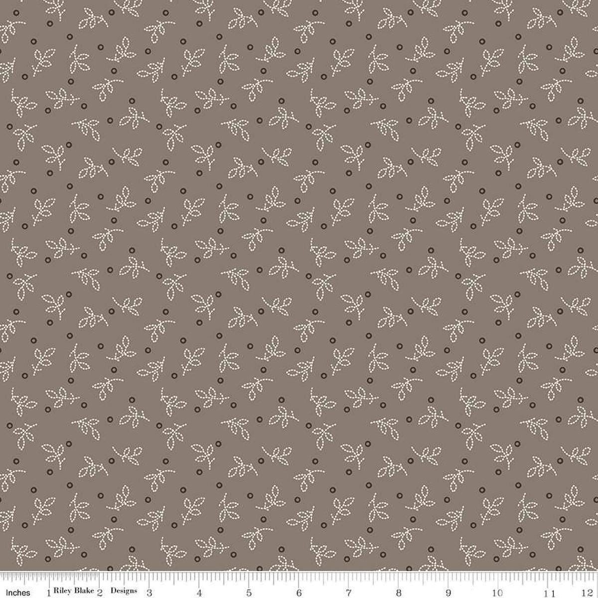 Image of the Gentler Times Pleasant Pebble quilting cotton fabric by Riley Blake Designs. Features dots on a gray background. Cute Little Fabric Shop