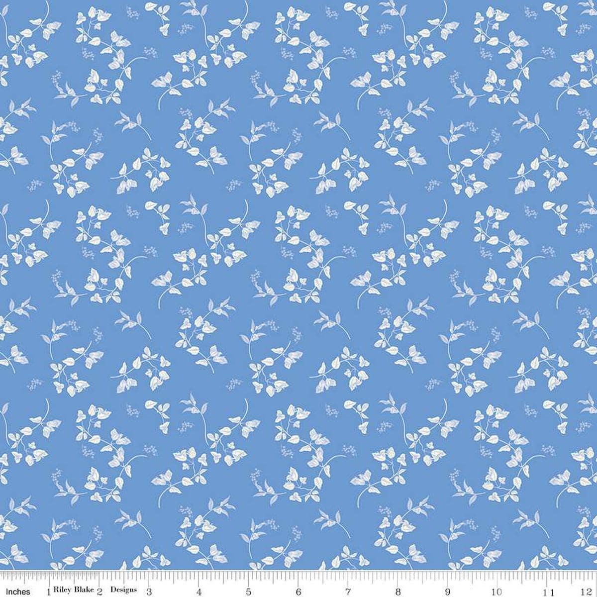 Image of Penelope Stems Blue quilting cotton fabric by My Mind's Eye for Riley Blake Designs. Features flowers on a blue background. Cute Little Fabric Shop