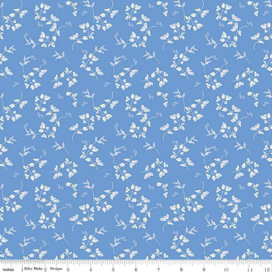 Image of Penelope Stems Blue quilting cotton fabric by My Mind's Eye for Riley Blake Designs. Features flowers on a blue background. Cute Little Fabric Shop