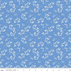 Image of Penelope Stems Blue quilting cotton fabric by My Mind's Eye for Riley Blake Designs. Features flowers on a blue background. Cute Little Fabric Shop