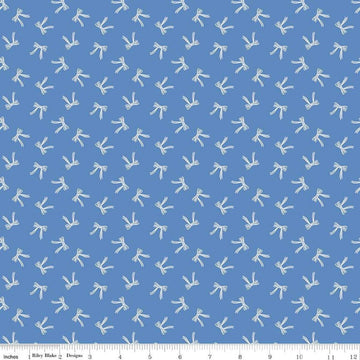 Image of Penelope Bows Blue quilting cotton fabric by My Mind's Eye for Riley Blake Designs. Features bows on a blue background. Cute Little Fabric Shop