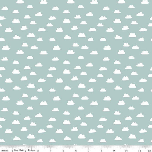 Image of the Baby Boy Clouds Blue quilting cotton fabric by Lori Whitlock for Riley Blake Designs. Features clouds on a blue background. Cute Little Fabric Shop