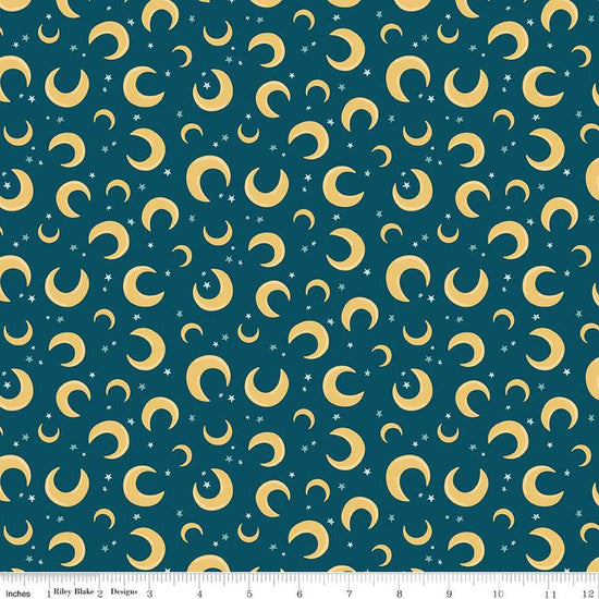 Image of the Baby Boy Moons Oxford quilting cotton fabric by Lori Whitlock for Riley Blake Designs. Features moons on a blue background. Cute Little Fabric Shop