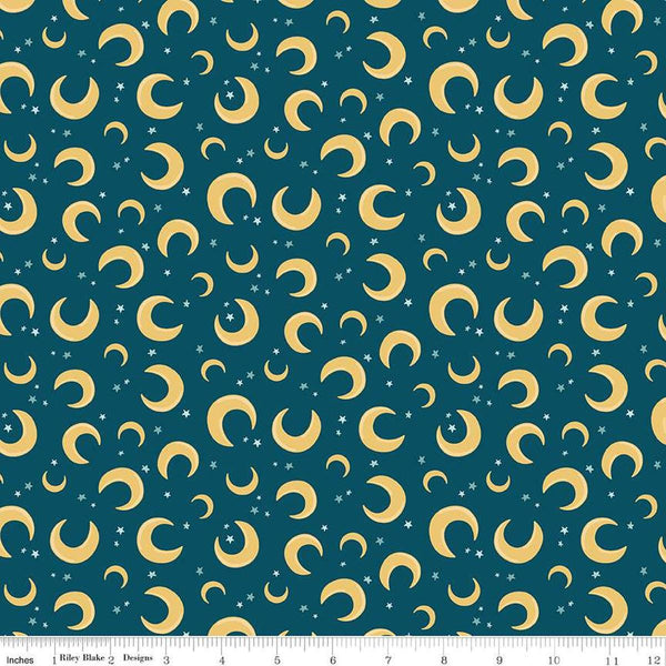 Image of the Baby Boy Moons Oxford quilting cotton fabric by Lori Whitlock for Riley Blake Designs. Features moons on a blue background. Cute Little Fabric Shop