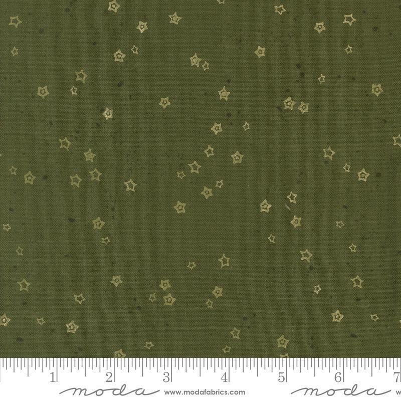 Images of Foraged Found Stardust Pine quilting cotton fabric by Fancy That Design House for Moda Fabrics. Features starts on a green background. Cute Little Fabric Shop