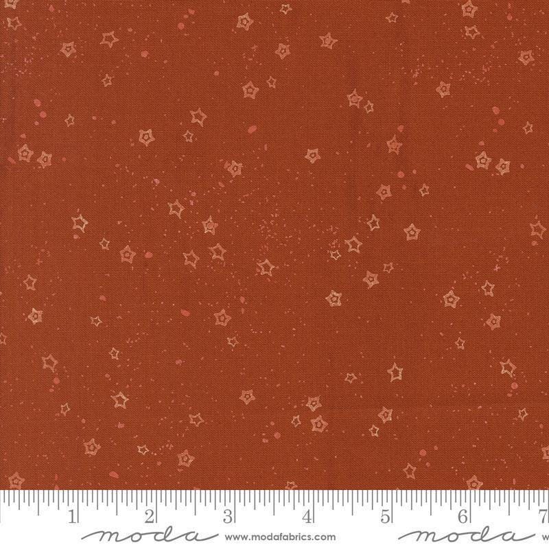 Images of Foraged Found Stardust Spice quilting cotton fabric by Fancy That Design House for Moda Fabrics. Features starts on a red background. Cute Little Fabric Shop