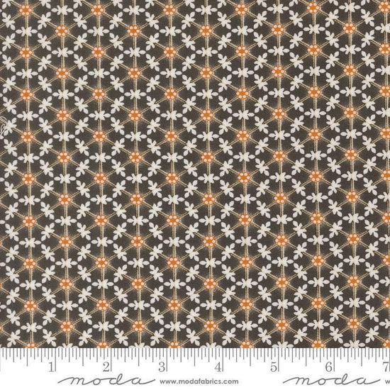 Image of the Agatha Road Wreaths Midnight quilting cotton fabric by Moda Fabrics. Features flowers on a brown background. Cute Little Fabric Shop
