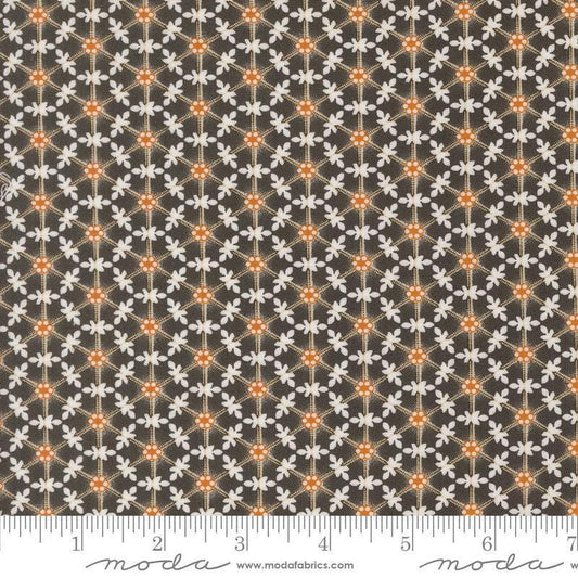Image of the Agatha Road Wreaths Midnight quilting cotton fabric by Moda Fabrics. Features flowers on a brown background. Cute Little Fabric Shop
