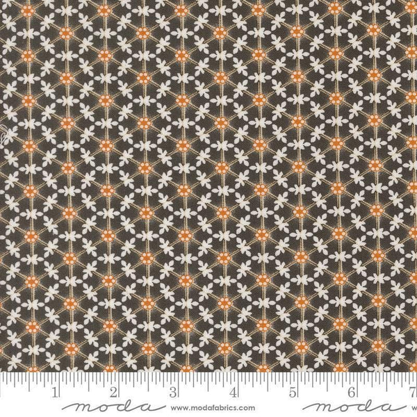 Image of the Agatha Road Wreaths Midnight quilting cotton fabric by Moda Fabrics. Features flowers on a brown background. Cute Little Fabric Shop