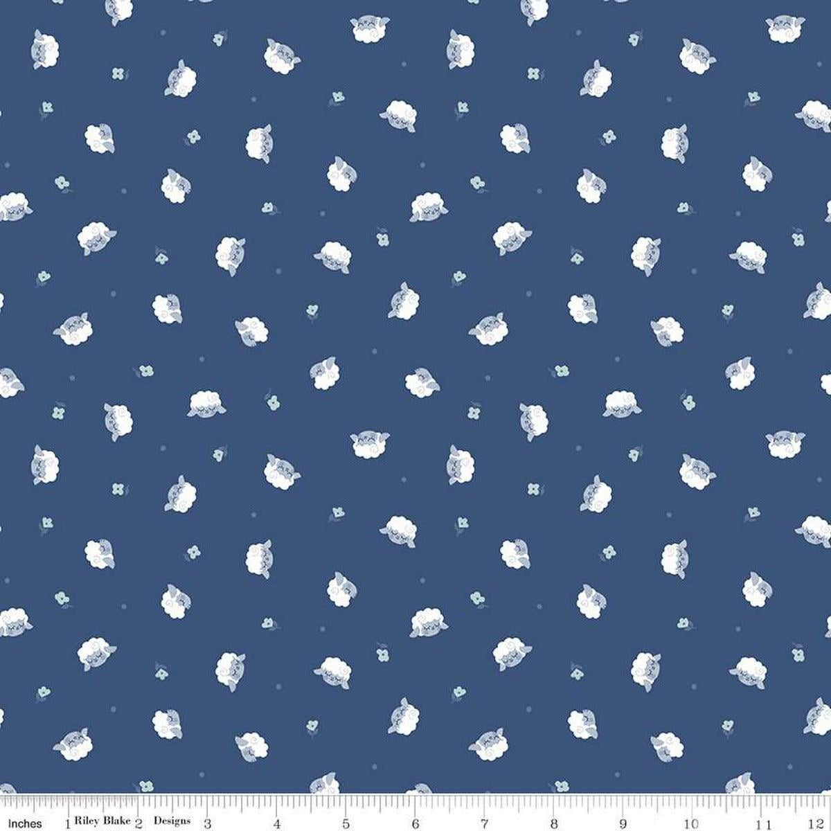 Image of the Twinkle Little Star Flock Nighttime quilting cotton fabric by Riley Blake Designs. Features sheep on a blue background. Cute Little Fabric Shop