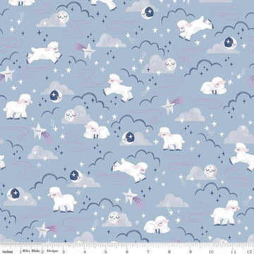 Image of the Twinkle Little Star Main Blue quilting cotton fabric by Riley Blake Designs. Features sheep on a blue background. Cute Little Fabric Shop
