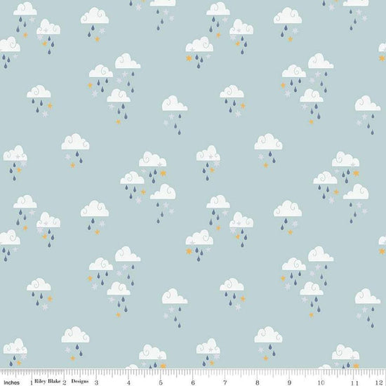 Image of the Twinkle Little Star Dream Skies Mist quilting cotton fabric by Riley Blake Designs. Features clouds on a blue background. Cute Little Fabric Shop