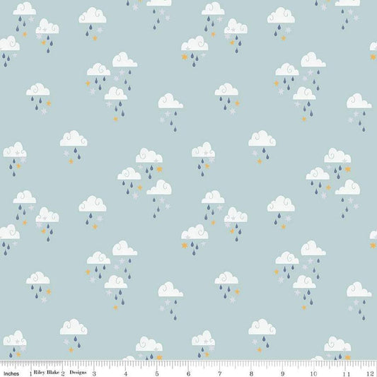 Image of the Twinkle Little Star Dream Skies Mist quilting cotton fabric by Riley Blake Designs. Features clouds on a blue background. Cute Little Fabric Shop