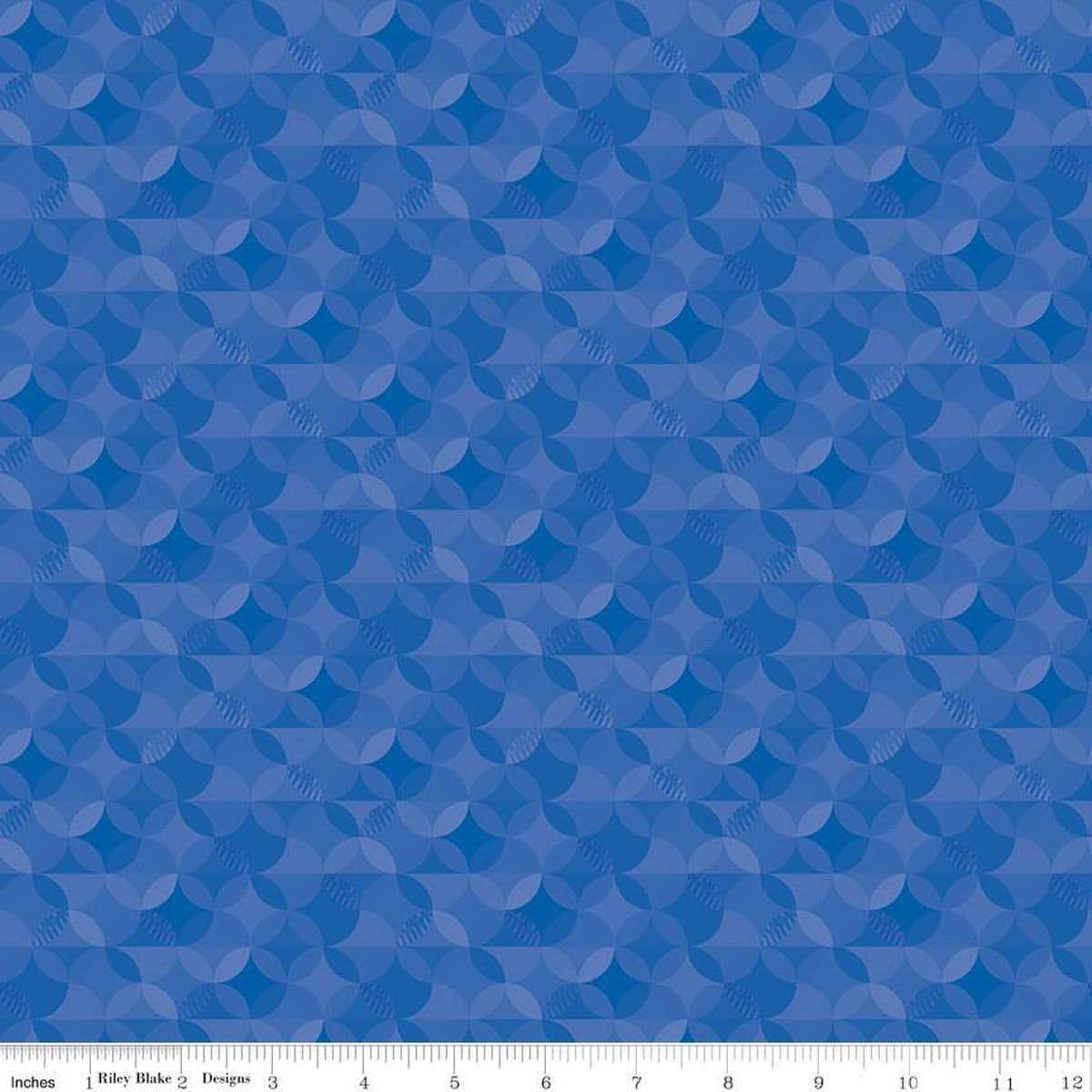 Image of the New Box of Crayons Kaleidoscope Blue Quilting Cotton Fabric by Riley Blake Designs. Features orange peel on a blue background. Cute Little Fabric Shop
