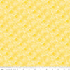 Image of the New Box of Crayons Kaleidoscope Yellow Quilting Cotton Fabric by Riley Blake Designs. Features orange peel on a yellow background. Cute Little Fabric Shop