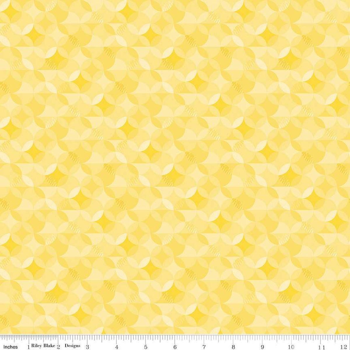 Image of the New Box of Crayons Kaleidoscope Yellow Quilting Cotton Fabric by Riley Blake Designs. Features orange peel on a yellow background. Cute Little Fabric Shop