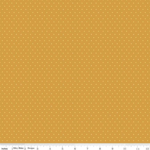 Image of Essence Foils Golden quilting cotton fabric by Fran Gulick for Riley Blake Designs. Features stars on a yellow background. Cute Little Fabric Shop