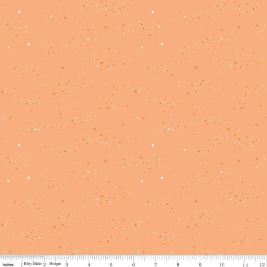 Image of Essence Starlight Marmalade quilting cotton fabric by Fran Gulick for Riley Blake Designs. Features stars on an orange background. Cute Little Fabric Shop