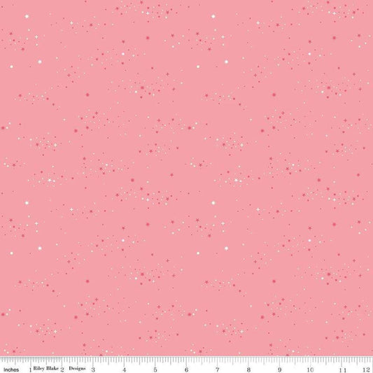 Image of Essence Starlight Pink quilting cotton fabric by Fran Gulick for Riley Blake Designs. Features stars on a pink background. Cute Little Fabric Shop