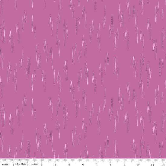 Image of Essence Raindrops Fuchsia quilting cotton fabric by Fran Gulick for Riley Blake Designs. Features rain on a purple background. Cute Little Fabric Shop
