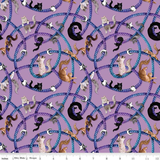 Image of Celtic Cats Main Lilac quilting cotton fabric by Brigid Ashwood for Riley Blake Designs. Features cats on a purple background. Cute Little Fabric Shop