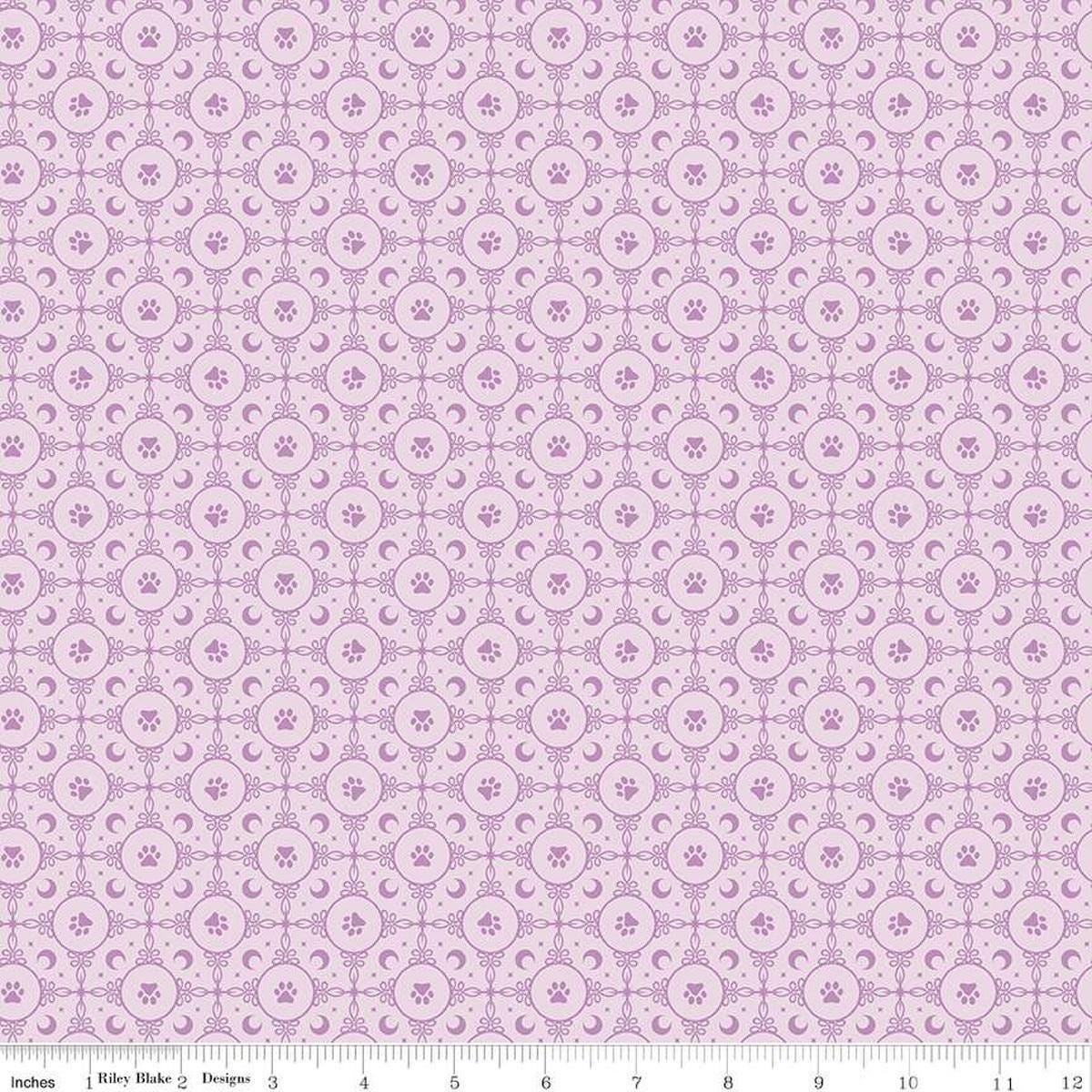 Image of Celtic Cats Circle Paws Lilac quilting cotton fabric by Brigid Ashwood for Riley Blake Designs. Features pawprints on a purple background. Cute Little Fabric Shop