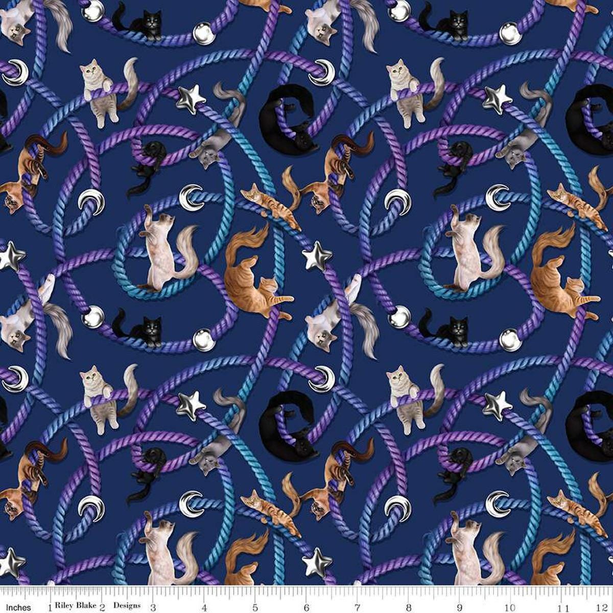 Image of Celtic Cats Main Navy quilting cotton fabric by Brigid Ashwood for Riley Blake Designs. Features cats on a blue background. Cute Little Fabric Shop
