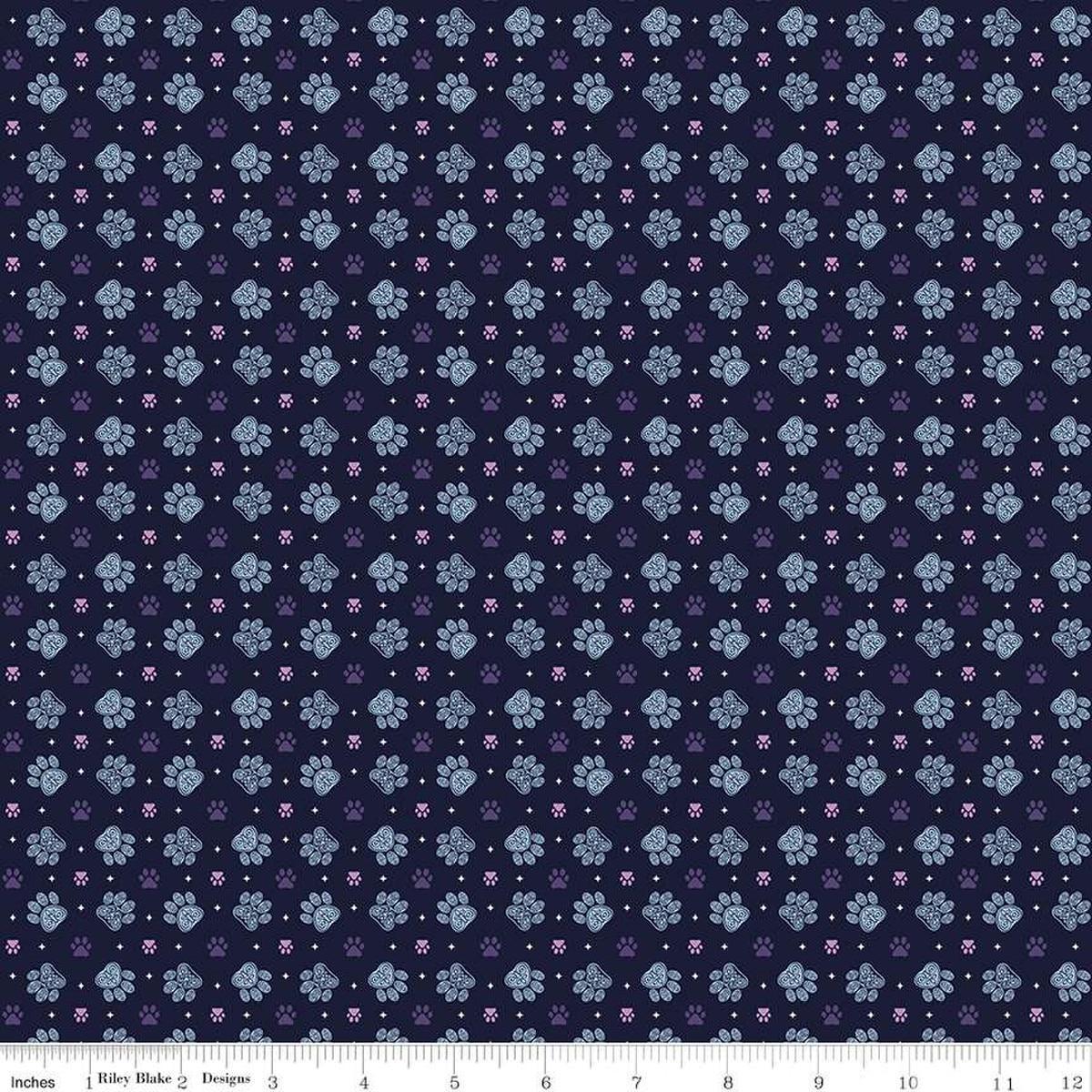 Image of Celtic Cats Paws Nighttime quilting cotton fabric by Brigid Ashwood for Riley Blake Designs. Features pawprints on a black background. Cute Little Fabric Shop