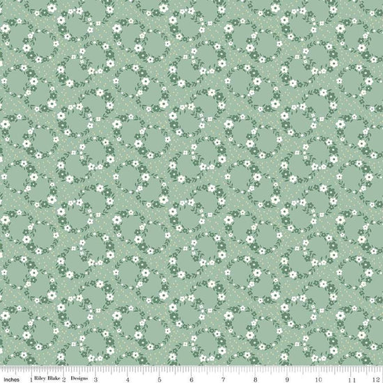 Image of Mary Catherine Wreaths Sage quilting cotton fabric by Amy Smart for Riley Blake Designs. Features flowers on a green background. Cute Little Fabric Shop