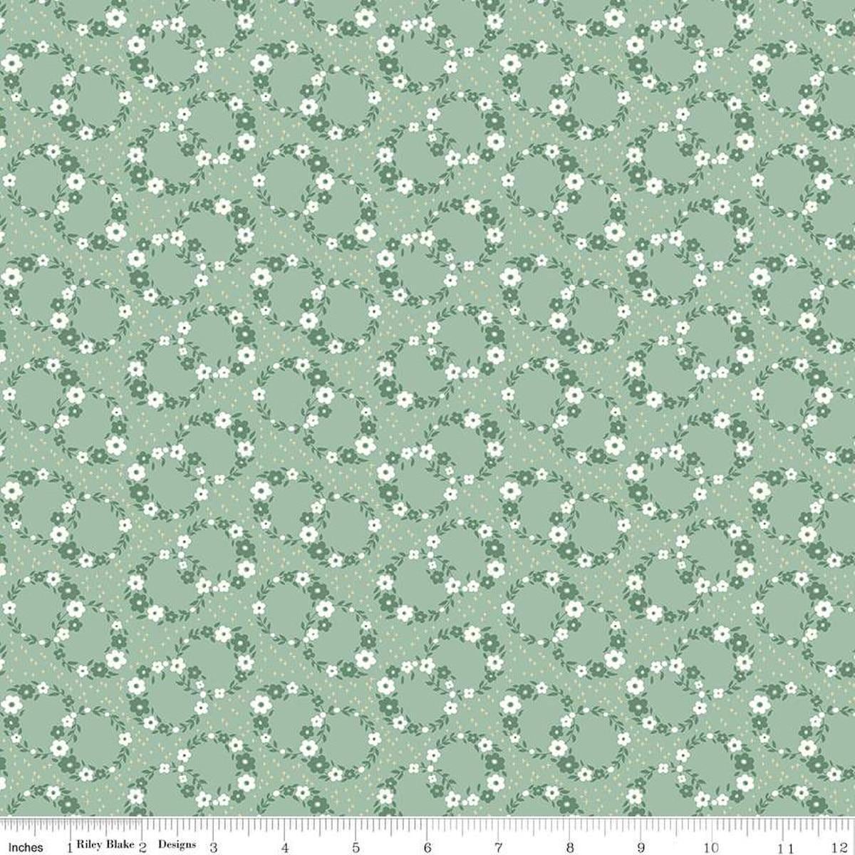 Image of Mary Catherine Wreaths Sage quilting cotton fabric by Amy Smart for Riley Blake Designs. Features flowers on a green background. Cute Little Fabric Shop