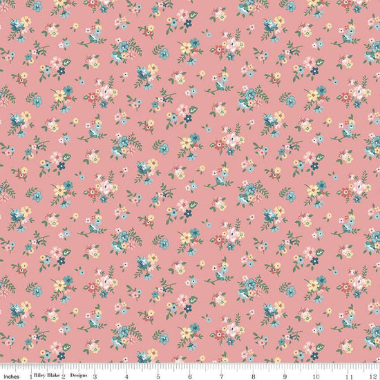 Image of Mary Catherine Ditsy Floral Mellow Rose quilting cotton fabric by Amy Smart for Riley Blake Designs. Features flowers on a red background. Cute Little Fabric Shop