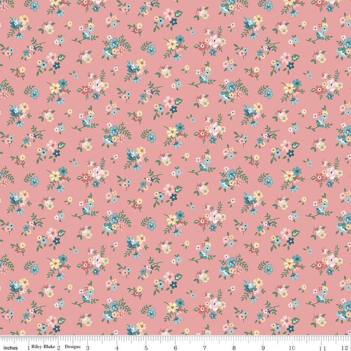 Image of Mary Catherine Ditsy Floral Mellow Rose quilting cotton fabric by Amy Smart for Riley Blake Designs. Features flowers on a red background. Cute Little Fabric Shop