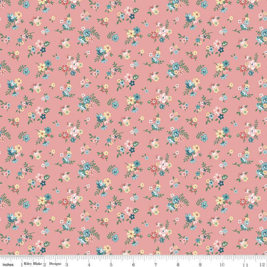 Image of Mary Catherine Ditsy Floral Mellow Rose quilting cotton fabric by Amy Smart for Riley Blake Designs. Features flowers on a red background. Cute Little Fabric Shop
