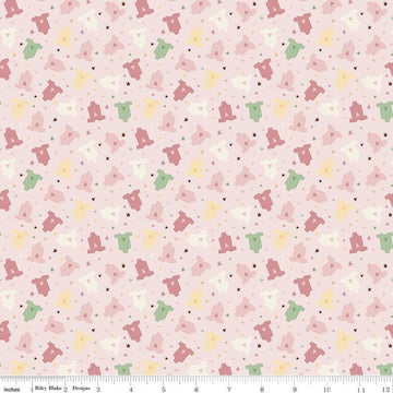 Image of Baby Girl Onesies Pink quilting cotton fabric by Lori Whitlock for Riley Blake Designs. Features onesies on a pink background. Cute Little Fabric Shop