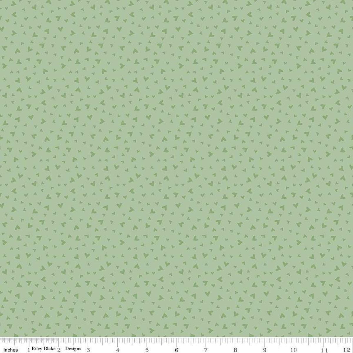 Image of Baby Girl Hearts Mint quilting cotton fabric by Lori Whitlock for Riley Blake Designs. Features hearts on a green background. Cute Little Fabric Shop