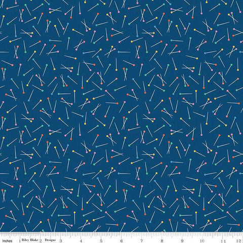 Image of Hand Made Pins Navy quilting cotton fabric by Amber Kemp-Gerstel for Riley Blake Designs. Features pins on a blue background. Cute Little Fabric Shop